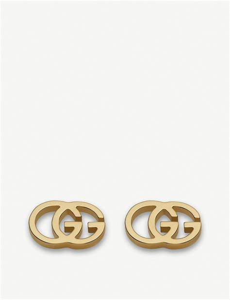 gucci gold earrings 18 carat.